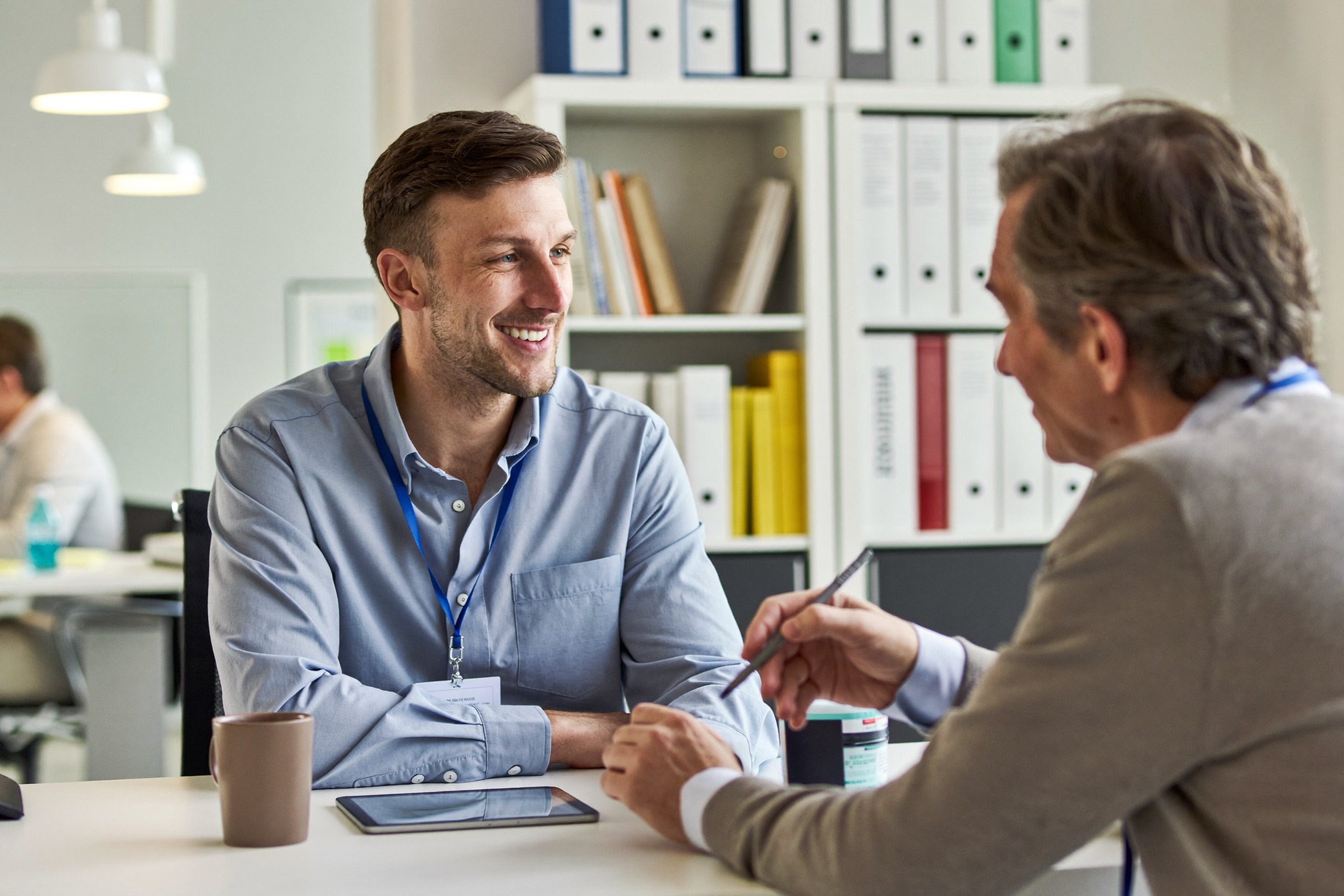 A licensed insurance agent reviewing plan options with a client
